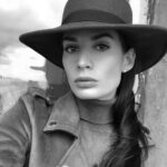 headshot of the author Val Razo